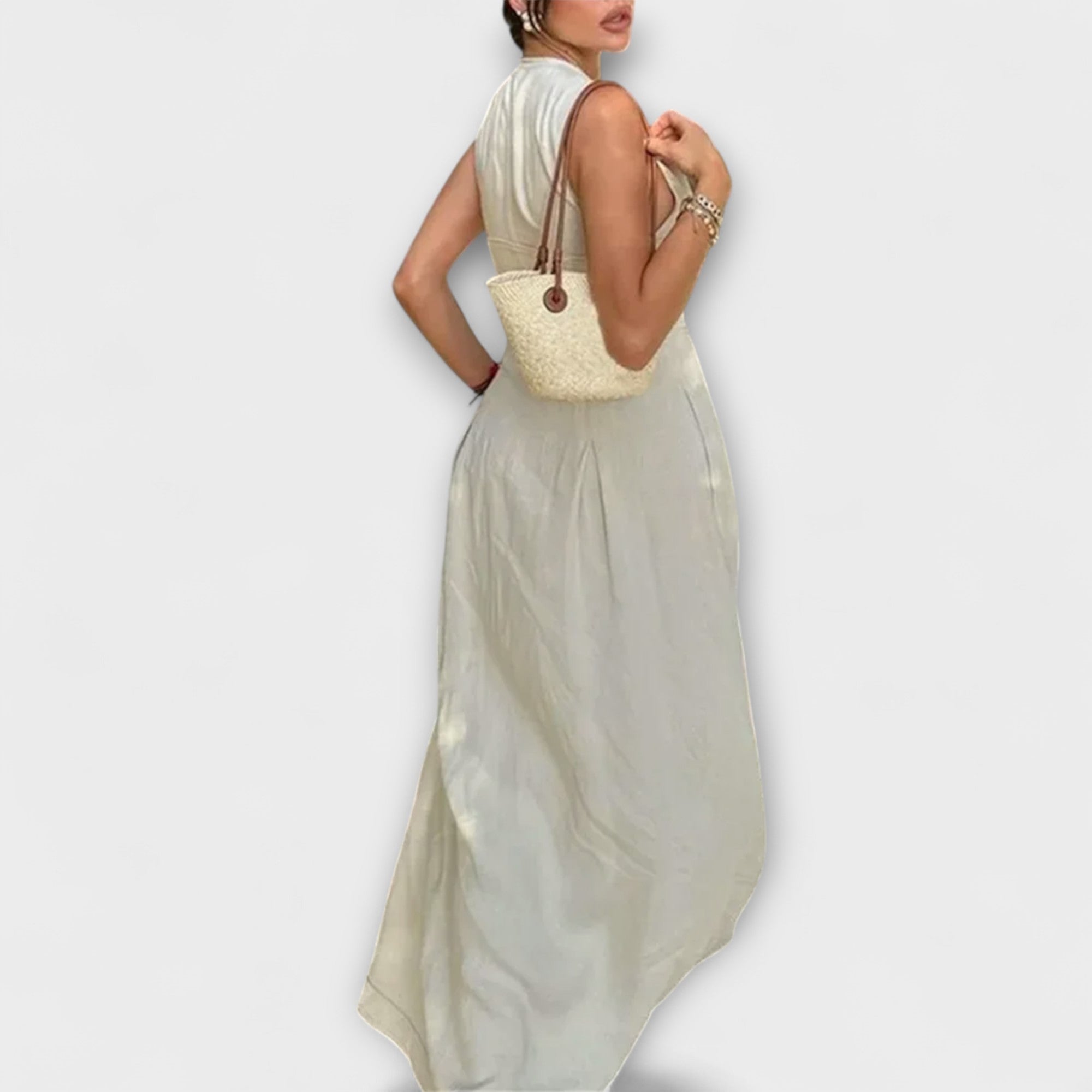 Bezrukávové plisované midi šaty typu bodycon